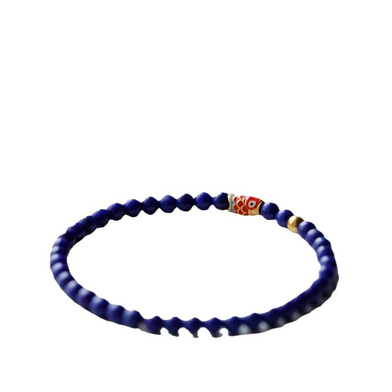 Lapis Lazuli Bracelet with Sand Gold Koi Fish and Spinning Beads