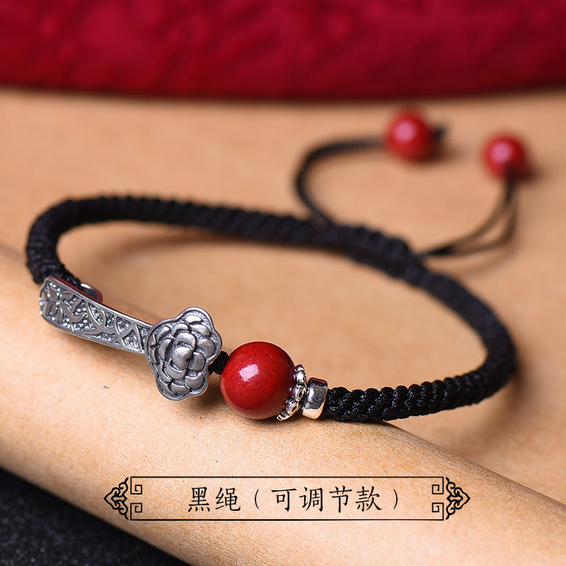 Cinnabar Bead Bracelet with Silver Ruyi and Red Cord