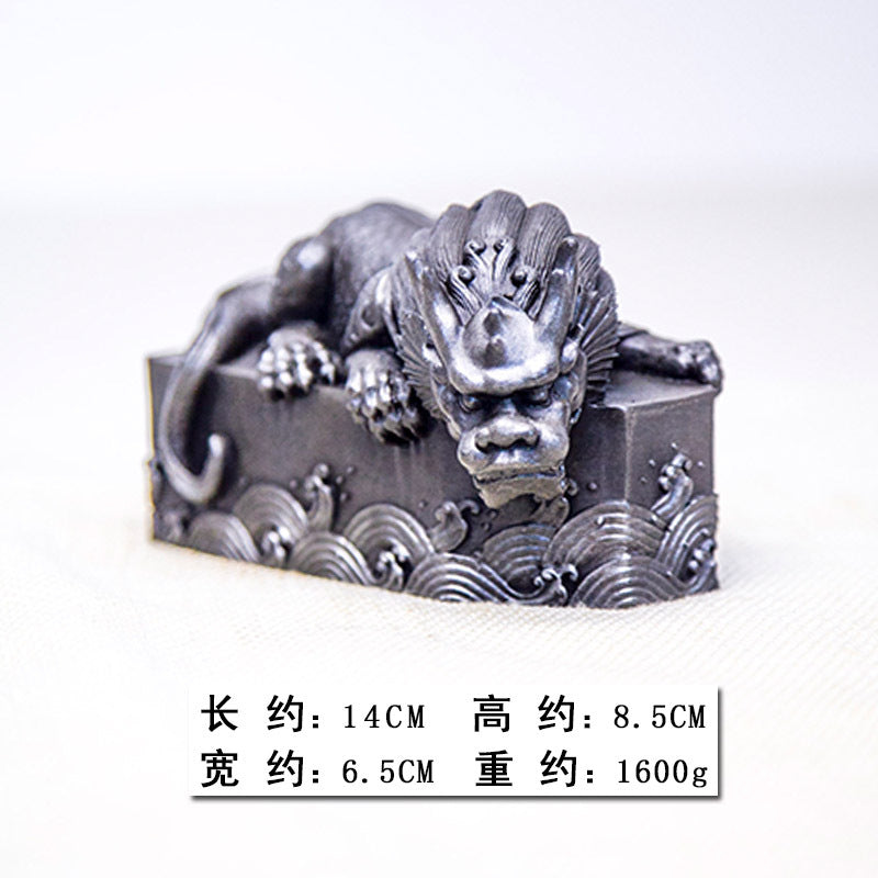 An iron-cast desktop figure in the Chinese style that depicts the water-repelling mythical beast "Gong Fu," signifying harmony and protection from water-related disasters
