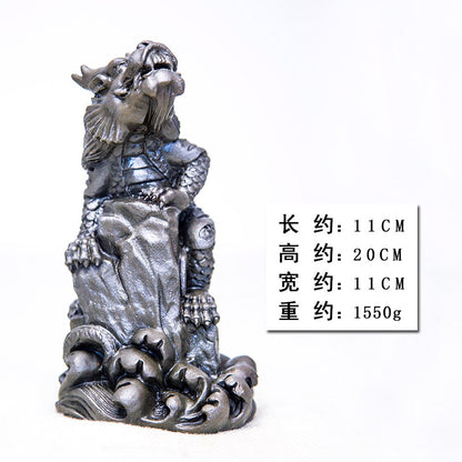 An iron-cast desktop figure in the Chinese style that depicts the water-repelling mythical beast "Gong Fu," signifying harmony and protection from water-related disasters