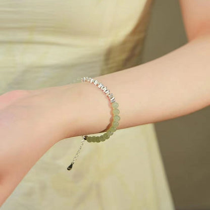 Natural Hetian Jade Bracelet with Small Fresh Style 925 Sterling Silver Bracelet, featuring a few taels of silver.