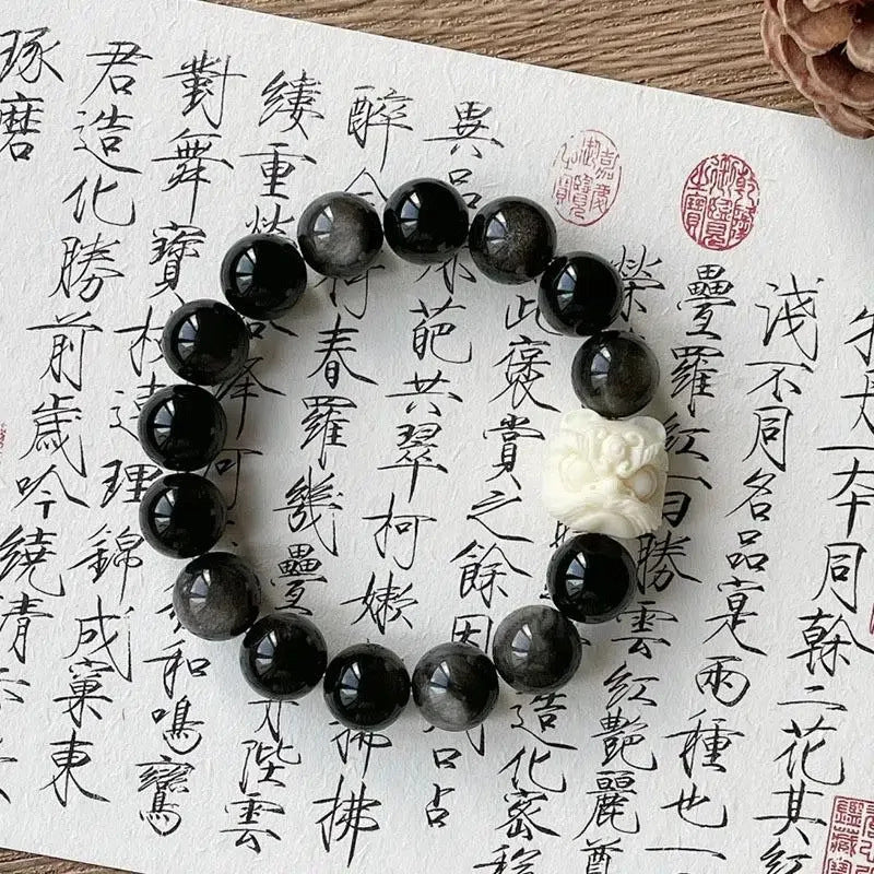 Ivory Nut and Guardian Lion Charm Bracelet with Natural White Jade Bodhi Beads
