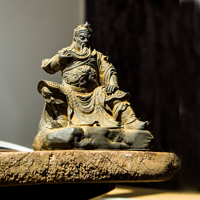 An iron-cast desktop figurine of Guan Yu (Lord Guan), the Martial Sage, in the Chinese style.