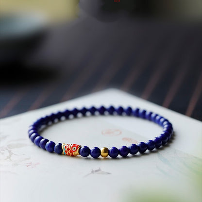 Lapis Lazuli Bracelet with Sand Gold Koi Fish and Spinning Beads