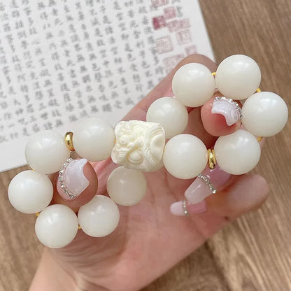 Ivory Nut and Guardian Lion Charm Bracelet with Natural White Jade Bodhi Beads