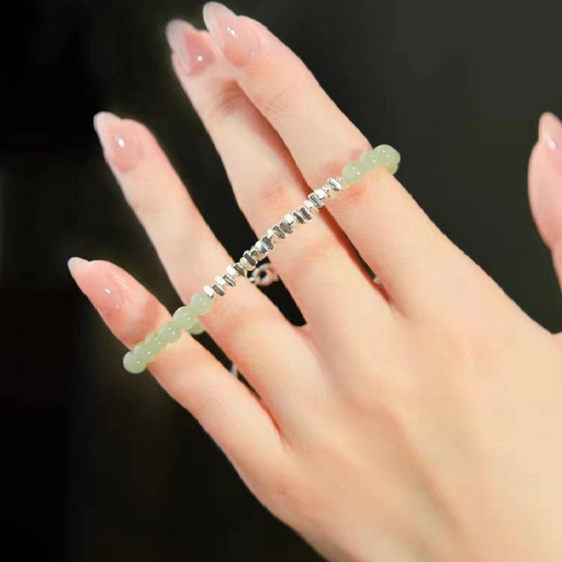 Natural Hetian Jade Bracelet with Small Fresh Style 925 Sterling Silver Bracelet, featuring a few taels of silver.