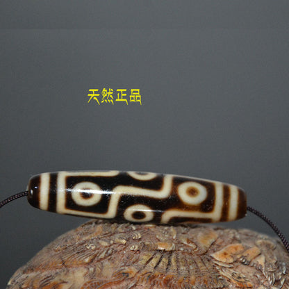 Tibetan Natural Dzi Bead Pendant with Weathered Pattern and High-Gloss Nine-Eyed Design