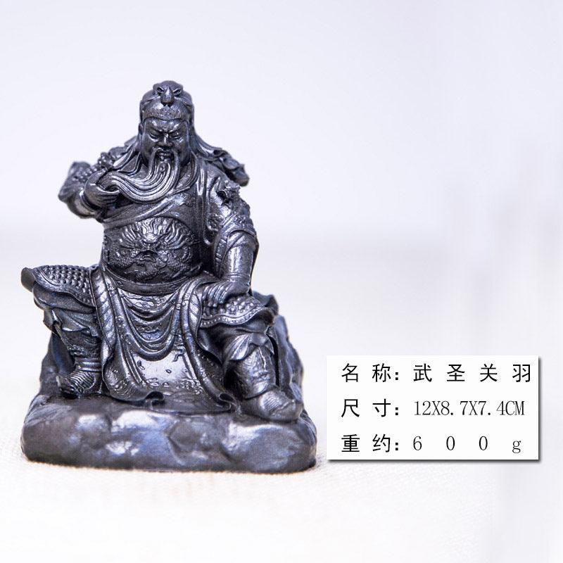 An iron-cast desktop figurine of Guan Yu (Lord Guan), the Martial Sage, in the Chinese style.