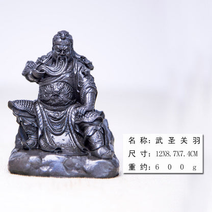 An iron-cast desktop figurine of Guan Yu (Lord Guan), the Martial Sage, in the Chinese style.
