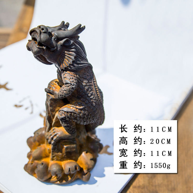 An iron-cast desktop figure in the Chinese style that depicts the water-repelling mythical beast "Gong Fu," signifying harmony and protection from water-related disasters